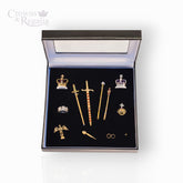 Set of decorative items including crowns and swords in a 'Crowns & Regalia' box on a white background.